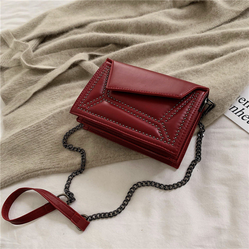 Cross-body rivet bag for lady