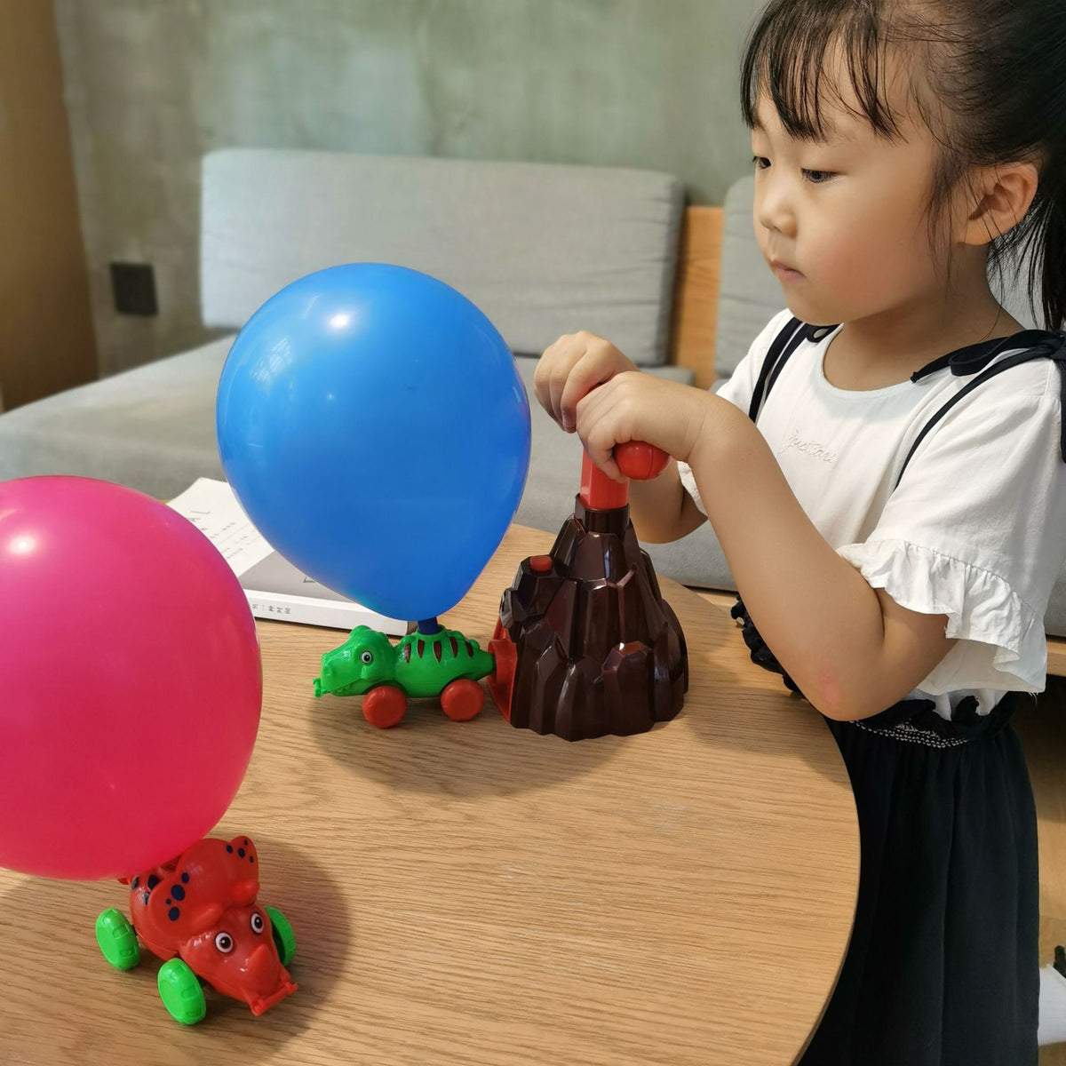 Dinosaur powered balloon car