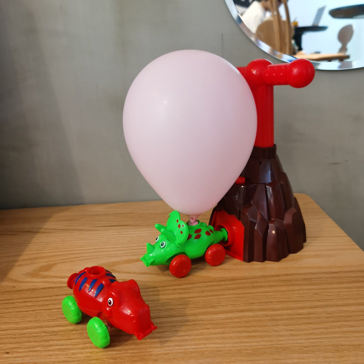 Dinosaur powered balloon car